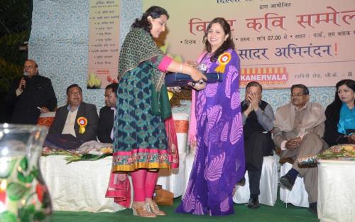 Dr. Charu WaliKhanna, Member, NCW was Guest of Honour at Grand Kavi Sammelan organized by Delhi Hindi Sahitya Sammelan and GK-II, RWA on 1st March, 2014