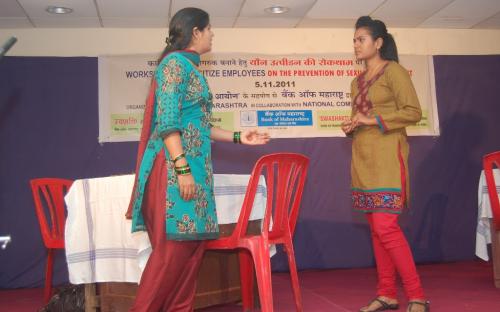 Scene relating to sexual harassment in office from DRAMA titled ‘Youn Peedan-Ek Gambhir Samasya’ on “sexual harassment – one serious problem’ written, directed and performed by employees of Bank of Maharashtra
